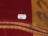 a close up of a piece of fabric with a price tag on it