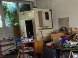 a room with a lot of clutter and a lot of stuff on the floor