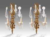 paire d'appliques murales anciennes ornées de pendentifs en cristal