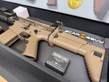 a gun that is on display in a display case
