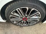a close up of a tire on a car ' s rim