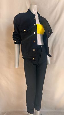 black and yellow jacket and pants on a mannequin mannequin mannequin mannequin mannequin mannequin mannequin mannequin
