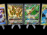four different types of pokemon cards are displayed on a black background