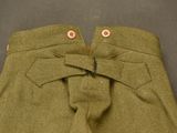 a close up of a pair of pants with a tie