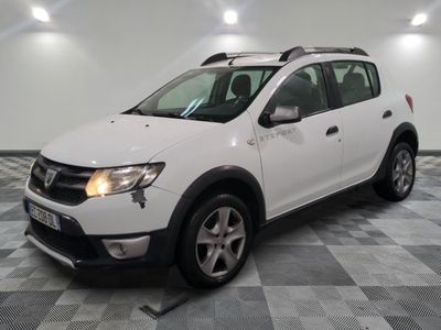 the white dacia is parked in a room with a checkered floor