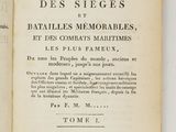 an open book with a black and white image of a man on a horse