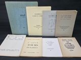un groupe de livres posés sur une table les uns à côté des autres