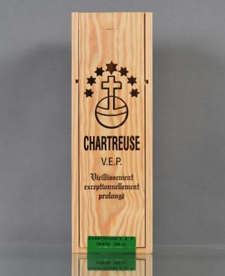 a wooden box with a green label on it that says chartreusse