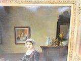 un tableau représentant une femme assise à une table dans une pièce