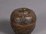 an image of a small wooden box sitting on top of a table