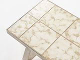 a white table with a marble top on a white background