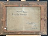 painting on easel with writing on it in front of a black background