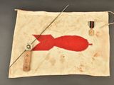 an image of a red fish on a piece of cloth