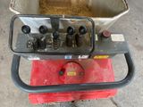 an image of a machine that is sitting on a cart