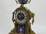 a clock that is sitting on top of a table