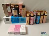 many different types of perfumes on the table