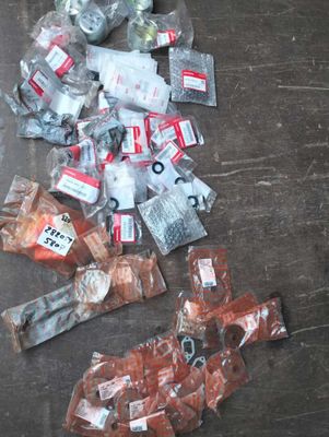 a pile of assorted items on a wooden floor