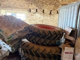 a pile of tires sitting in the middle of a room