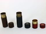 several different types of brass and wood containers on a white surface