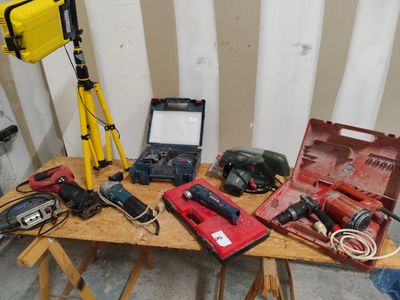 a lot of tools that are on a table