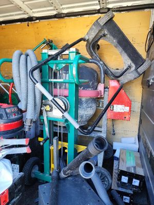 a pile of tools in the back of a truck