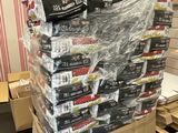 a large stack of boxes of food sitting on top of a table