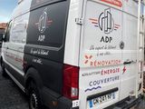 a van that is parked on the side of the road
