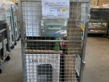 a metal cart with several boxes on it in a warehouse