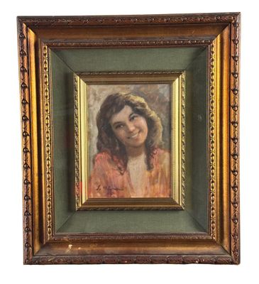 une peinture à l'huile représentant une femme en robe rouge, dans un cadre doré