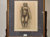 une photo d'un dessin représentant une femme sur un chevalet