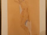 painting of a nude woman standing in front of a yellow wall