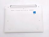 a white laptop with a blue logo on it