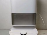 an image of a water dispenser on a table
