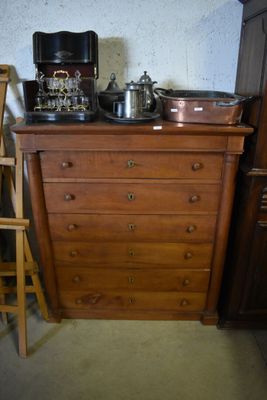 a dresser with a record player on top of it