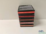 a stack of four lipsticks sitting on top of each other