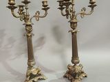 pair of antique brass candelabs with flowers and leaves