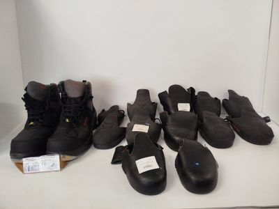many pairs of shoes that are lined up on a table