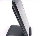 a cell phone that is sitting on top of a stand