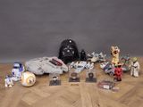 a lot of star wars action figures on the floor