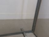 an image of a metal gate with a mesh screen