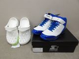 shoes and a box with a pair of white and blue shoes on it