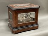 a glass case with a picture of a castle inside of it