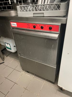 a silver dishwasher and a silver dishwasher in a kitchen