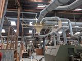a large machine that is sitting inside of a building