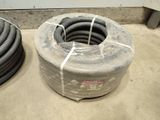 two hoses sitting next to each other on the floor