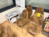 four chairs and a table in a room with a window