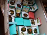 a box full of teas and tea bags in it