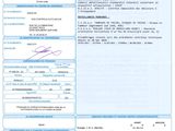 un gros plan d'un document sur lequel figure la photo d'une personne