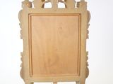 a wooden easel with a wooden frame on it