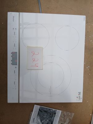 une photo d'une plaque de cuisson sur laquelle figure l'image d'un homme
